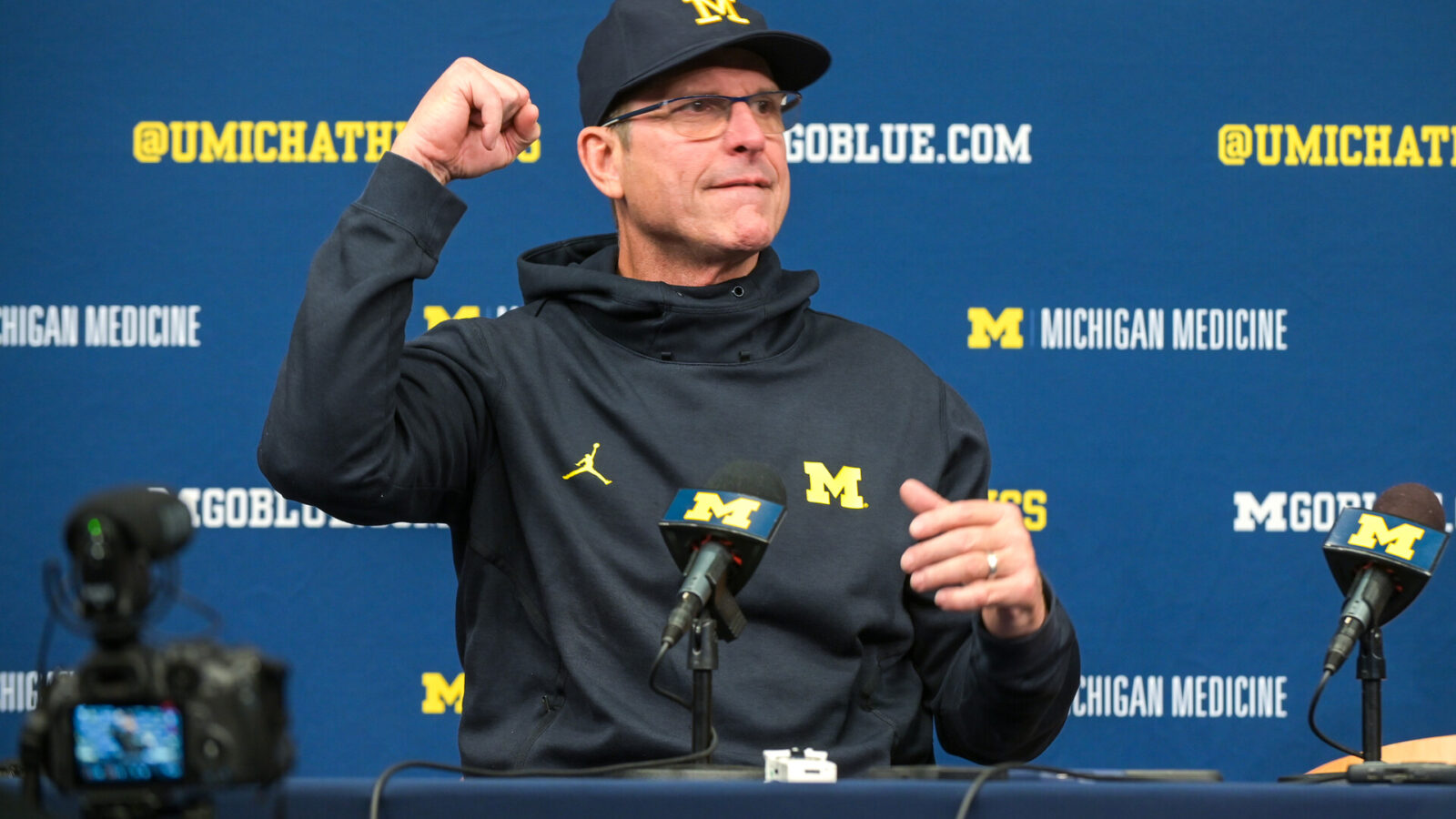Head coach Jim Harbaugh of the Michigan Wolverines speaks to the media after the game against the Illinois Fighting Illini at Michigan Stadium on November 19, 2022 in Ann Arbor, Michigan. The Wolverines won 19-17.
