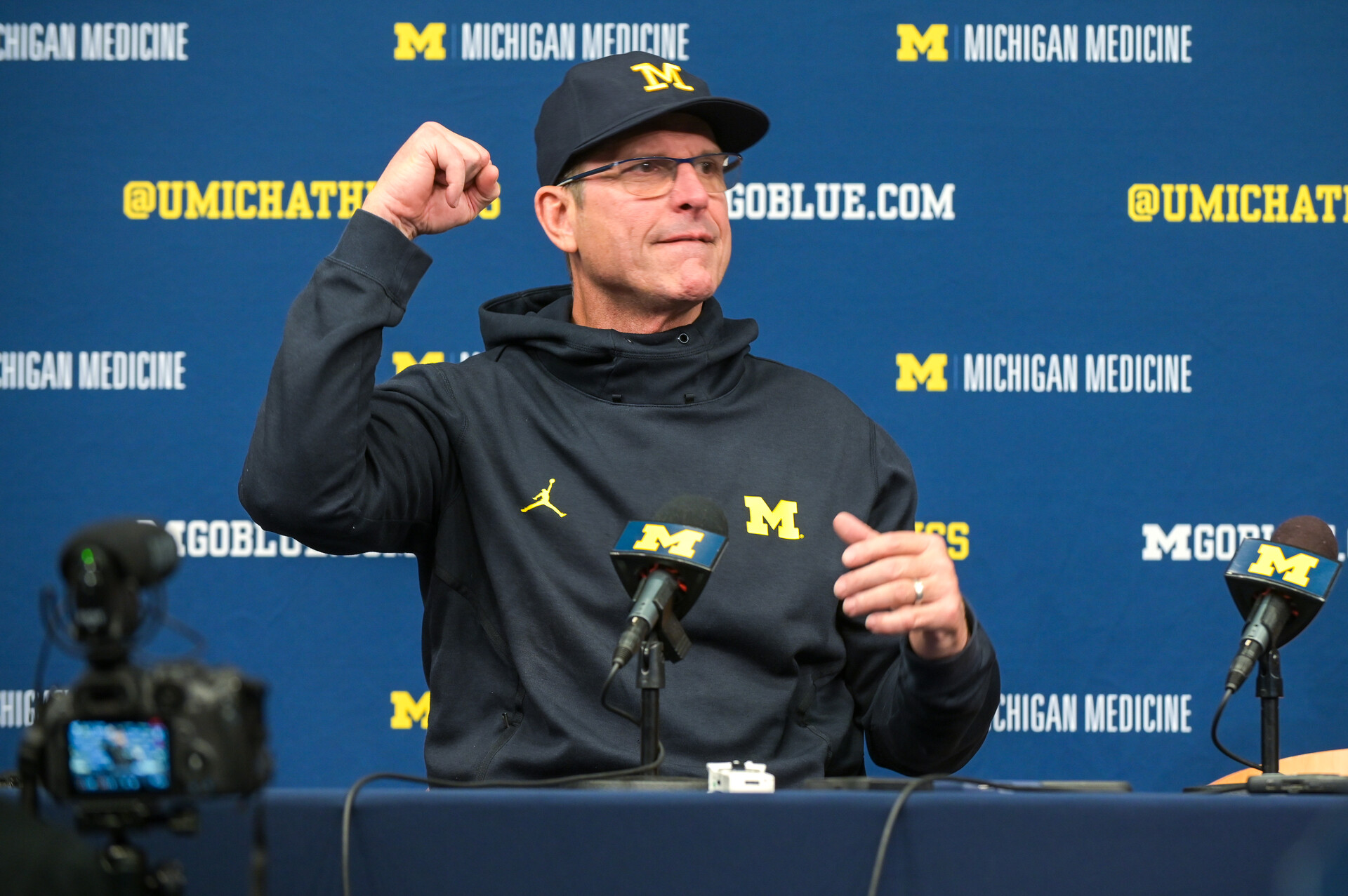 Head coach Jim Harbaugh of the Michigan Wolverines speaks to the media after the game against the Illinois Fighting Illini at Michigan Stadium on November 19, 2022 in Ann Arbor, Michigan. The Wolverines won 19-17.