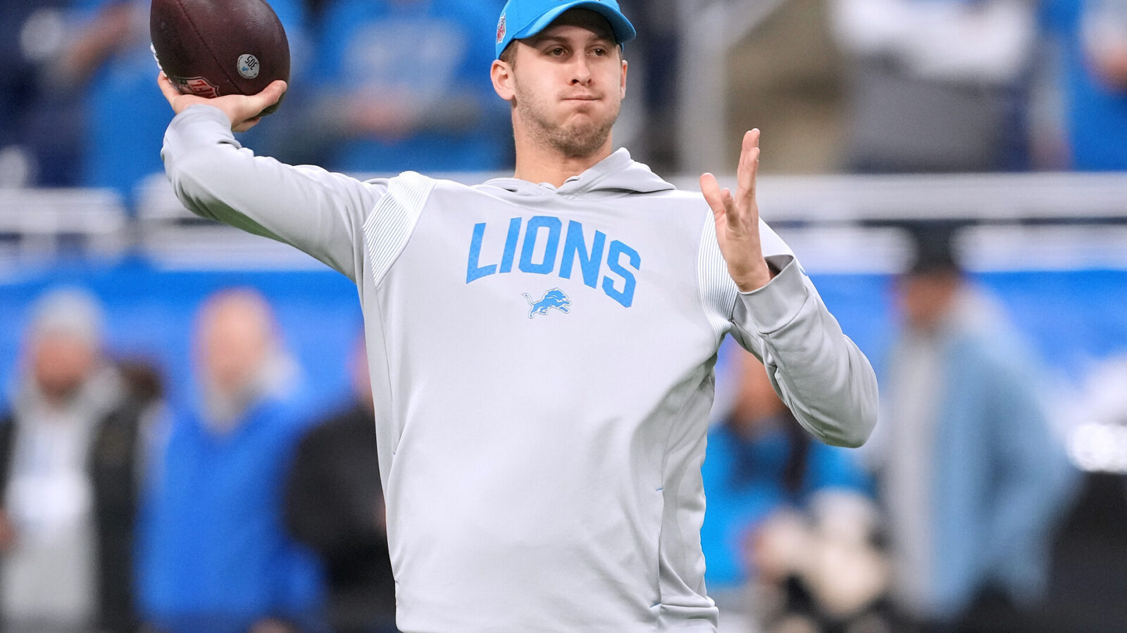 Jared Goff #16 of the Detroit Lions warms up before the game against the Jacksonville Jaguars at Ford Field on December 04, 2022 in Detroit, Michigan.