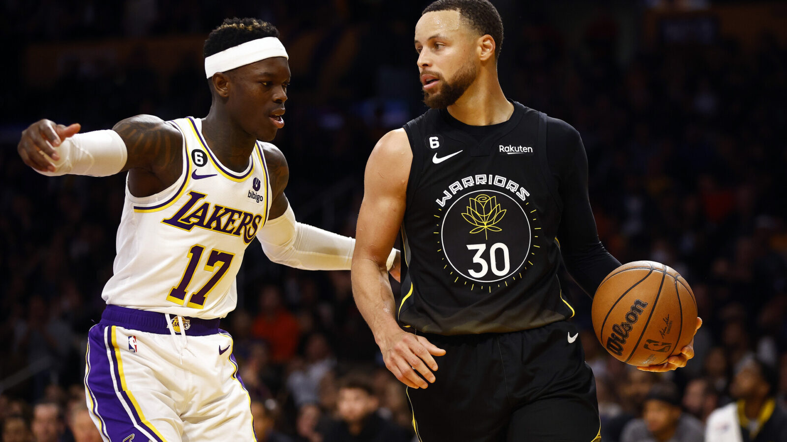Stephen Curry #30 of the Golden State Warriors controls the ball against Dennis Schroder #17 of the Los Angeles Lakers in the second half at Crypto.com Arena on March 05, 2023 in Los Angeles, California.
