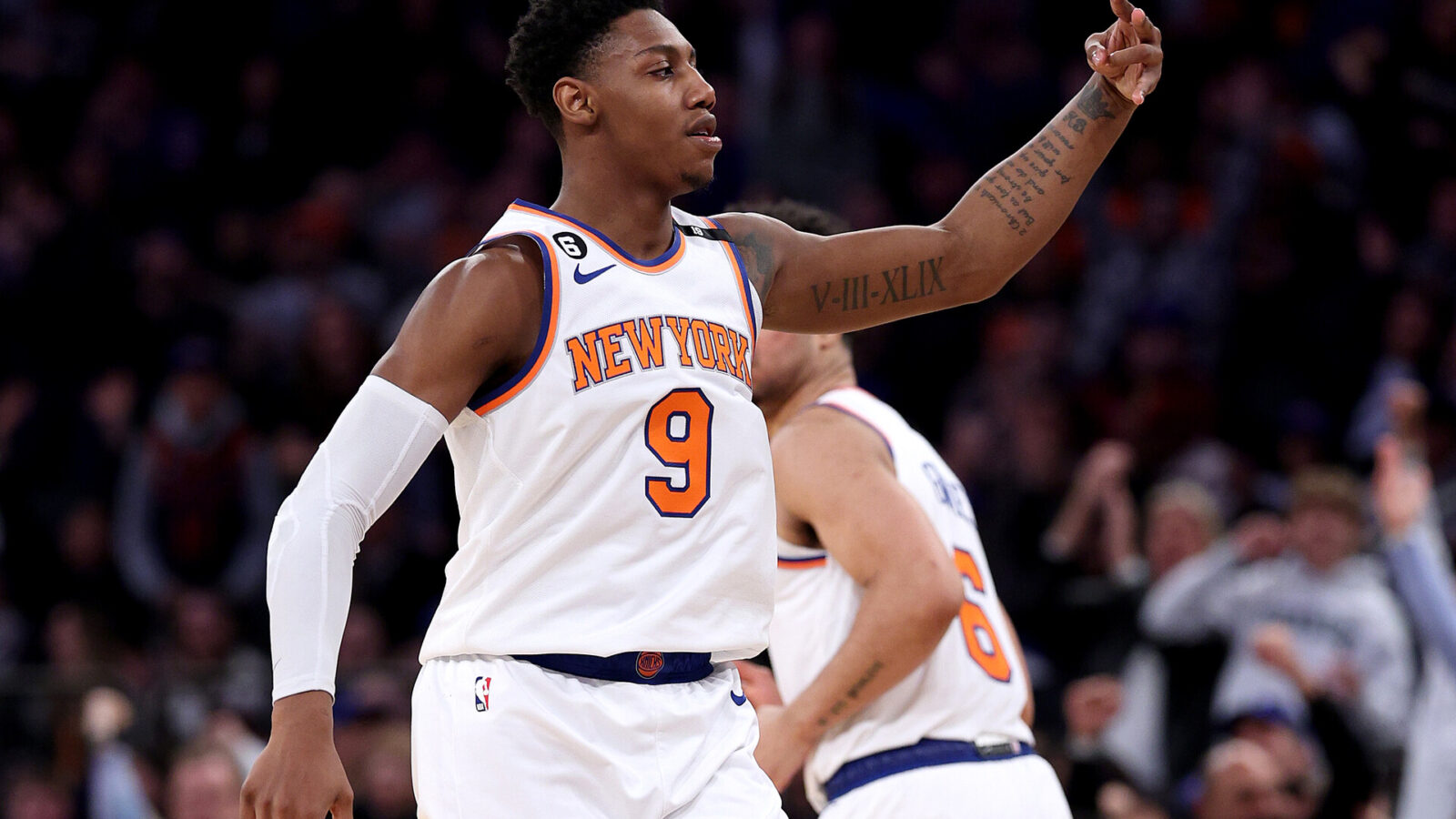 RJ Barrett #9 of the New York Knicks celebrates teammate Quentin Grimes' three point shot in the fourth quarter against the Indiana Pacers at Madison Square Garden on April 09, 2023 in New York City.