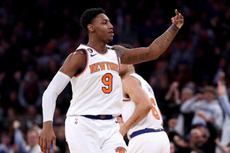 RJ Barrett #9 of the New York Knicks celebrates teammate Quentin Grimes' three point shot in the fourth quarter against the Indiana Pacers at Madison Square Garden on April 09, 2023 in New York City.