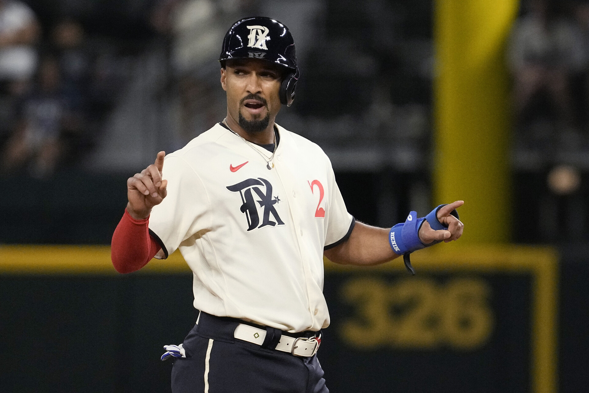 Marcus Semien #2 of the Texas Rangers stands on second base during the game against the Oakland Athletics at Globe Life Field on April 21, 2023 in Arlington, Texas.