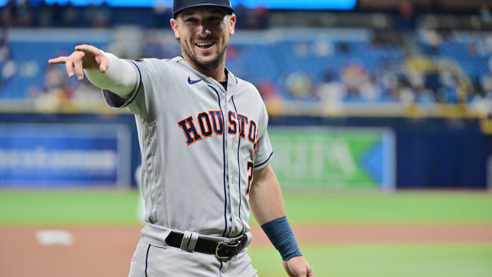 Alex Bregman #2 of the Houston Astros gestures to a fan prior to a game against the Tampa Bay Rays at Tropicana Field on April 24, 2023 in St Petersburg, Florida.