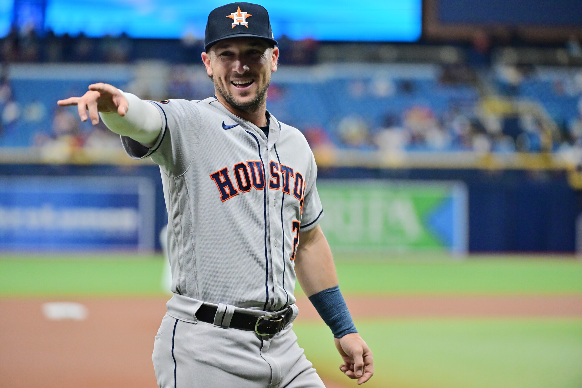 Alex Bregman #2 of the Houston Astros gestures to a fan prior to a game against the Tampa Bay Rays at Tropicana Field on April 24, 2023 in St Petersburg, Florida.