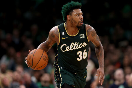 Marcus Smart #36 of the Boston Celtics dribbles against the Atlanta Hawks during the third quarter in game five of the Eastern Conference First Round Playoffs at TD Garden on April 25, 2023 in Boston, Massachusetts.