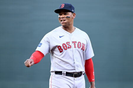 Rafael Devers #11 of the Boston Red Sox plays third base against the Baltimore Orioles at Oriole Park at Camden Yards on April 24, 2023 in Baltimore, Maryland.