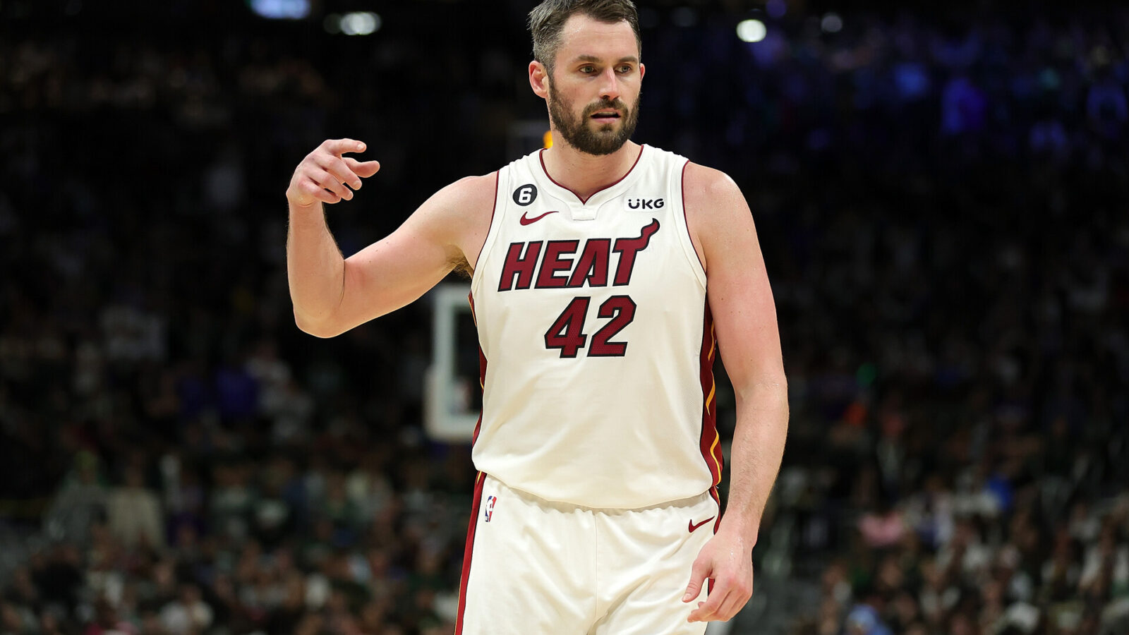 Kevin Love #42 of the Miami Heat walks backcourt against the Milwaukee Bucks during Game 5 of the Eastern Conference First Round Playoffs at Fiserv Forum on April 26, 2023 in Milwaukee, Wisconsin. The Heat defeated the Bucks in overtime 128-126.