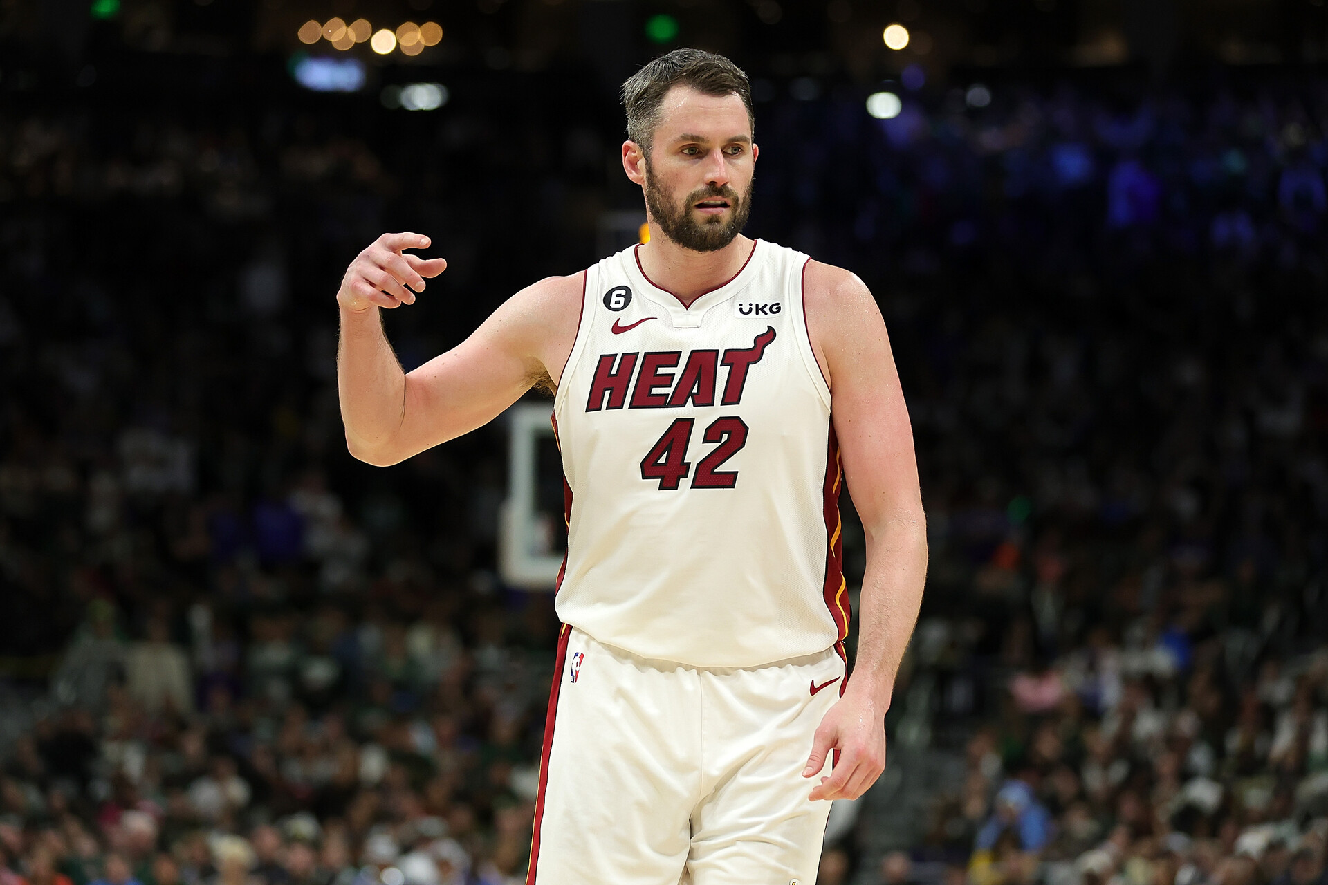 Kevin Love #42 of the Miami Heat walks backcourt against the Milwaukee Bucks during Game 5 of the Eastern Conference First Round Playoffs at Fiserv Forum on April 26, 2023 in Milwaukee, Wisconsin. The Heat defeated the Bucks in overtime 128-126.