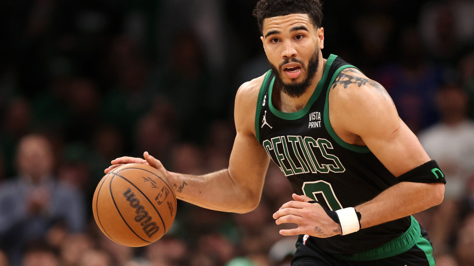 Jayson Tatum #0 of the Boston Celtics dribbles against the Philadelphia 76ers during the second half in game one of the Eastern Conference Second Round Playoffs at TD Garden on May 01, 2023 in Boston, Massachusetts.