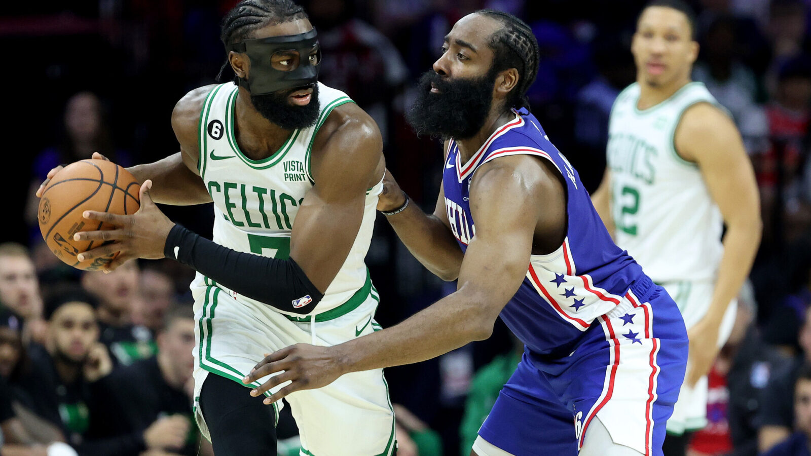 Jaylen Brown #7 of the Boston Celtics looks to pass against James Harden #1 of the Philadelphia 76ers during the third quarter in game four of the Eastern Conference Second Round Playoffs at Wells Fargo Center on May 07, 2023 in Philadelphia, Pennsylvania.