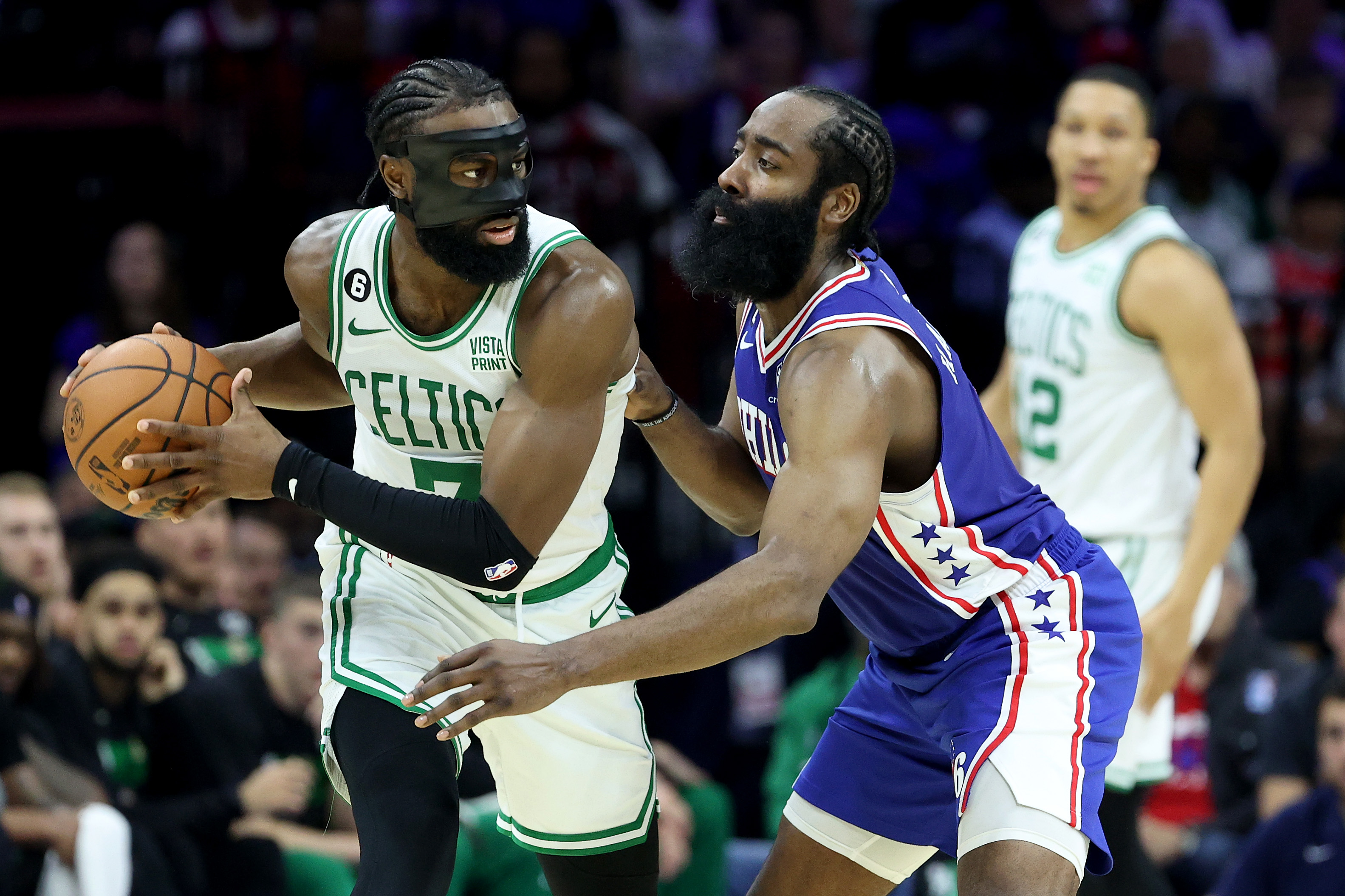 Jaylen Brown #7 of the Boston Celtics looks to pass against James Harden #1 of the Philadelphia 76ers during the third quarter in game four of the Eastern Conference Second Round Playoffs at Wells Fargo Center on May 07, 2023 in Philadelphia, Pennsylvania.