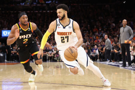 Jamal Murray #27 of the Denver Nuggets drives the ball past Josh Okogie #2 of the Phoenix Suns during Game Four of the NBA Western Conference Semifinals at Footprint Center on May 07, 2023 in Phoenix, Arizona. The Suns defeated the Nuggets 129-124.