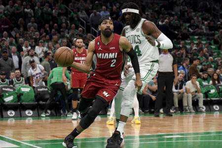 May 17, 2023; Boston, Massachusetts, USA; Miami Heat guard Gabe Vincent (2) dribbles against Boston Celtics center Robert Williams III (44) during the first quarter in game one of the Eastern Conference Finals for the 2023 NBA playoffs at TD Garden.