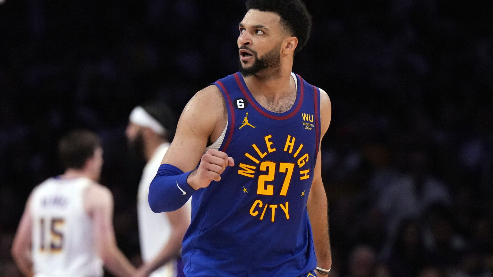 Denver Nuggets guard Jamal Murray (27) reacts in the fourth quarter against the Los Angeles Lakers during game three of the Western Conference Finals for the 2023 NBA playoffs at Crypto.com Arena.