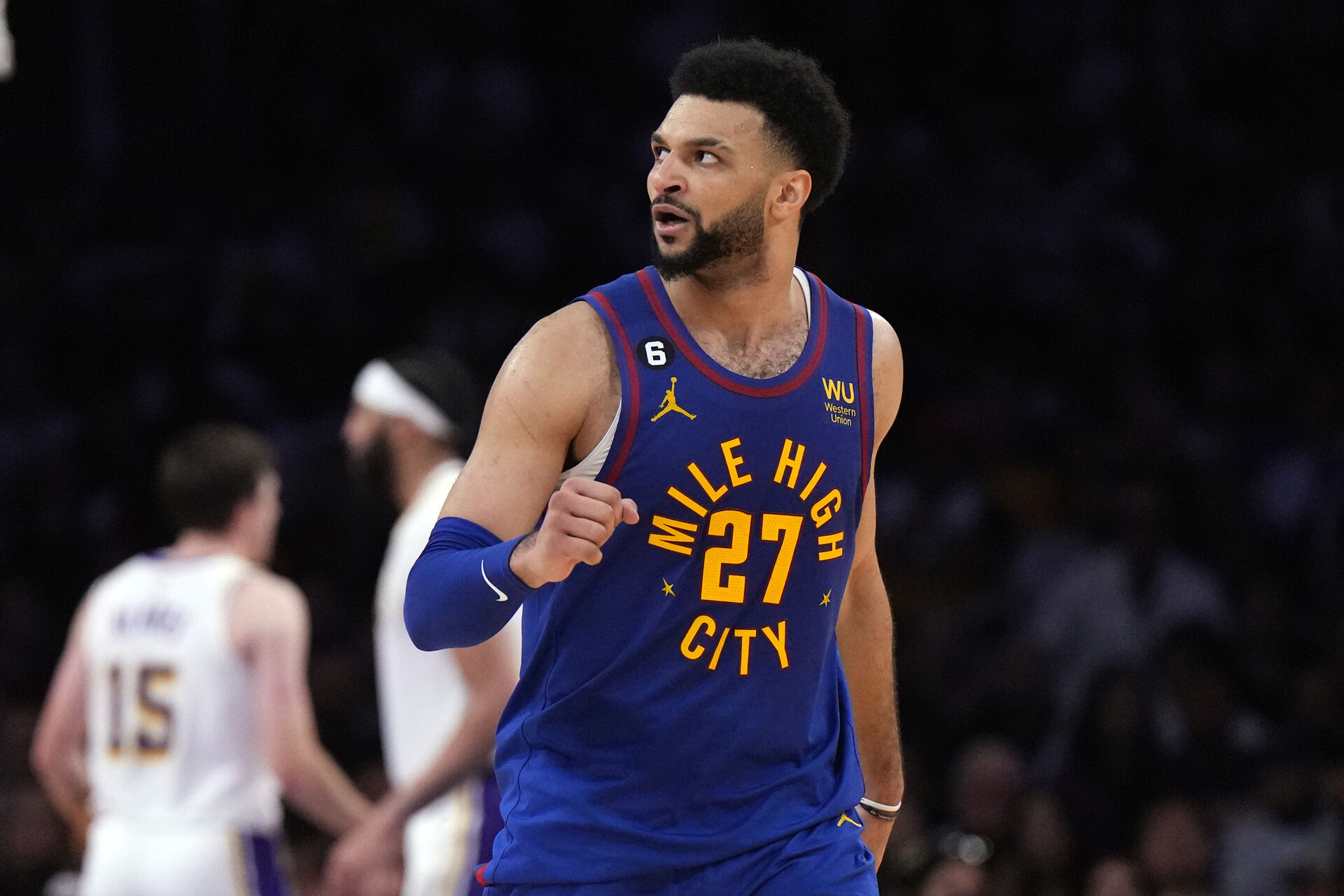 Denver Nuggets guard Jamal Murray (27) reacts in the fourth quarter against the Los Angeles Lakers during game three of the Western Conference Finals for the 2023 NBA playoffs at Crypto.com Arena.