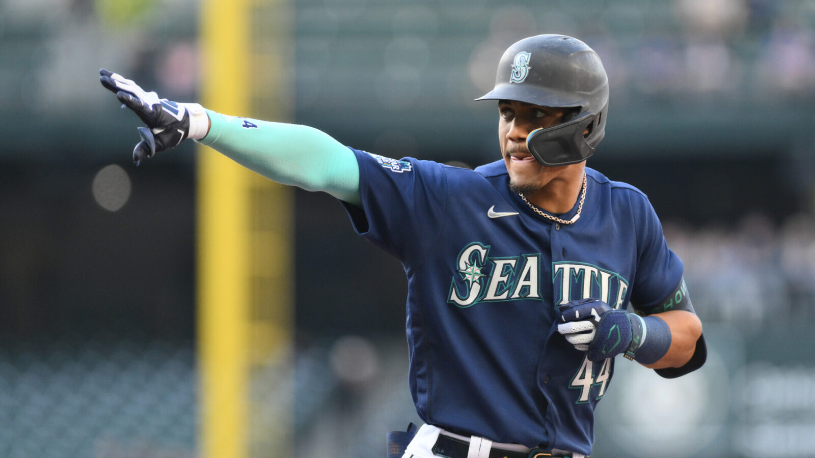 Seattle Mariners center fielder Julio Rodriguez (44) points to the dugout after hitting a single against the Oakland Athletics during the second inning at T-Mobile Park.