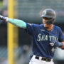 Seattle Mariners center fielder Julio Rodriguez (44) points to the dugout after hitting a single against the Oakland Athletics during the second inning at T-Mobile Park.