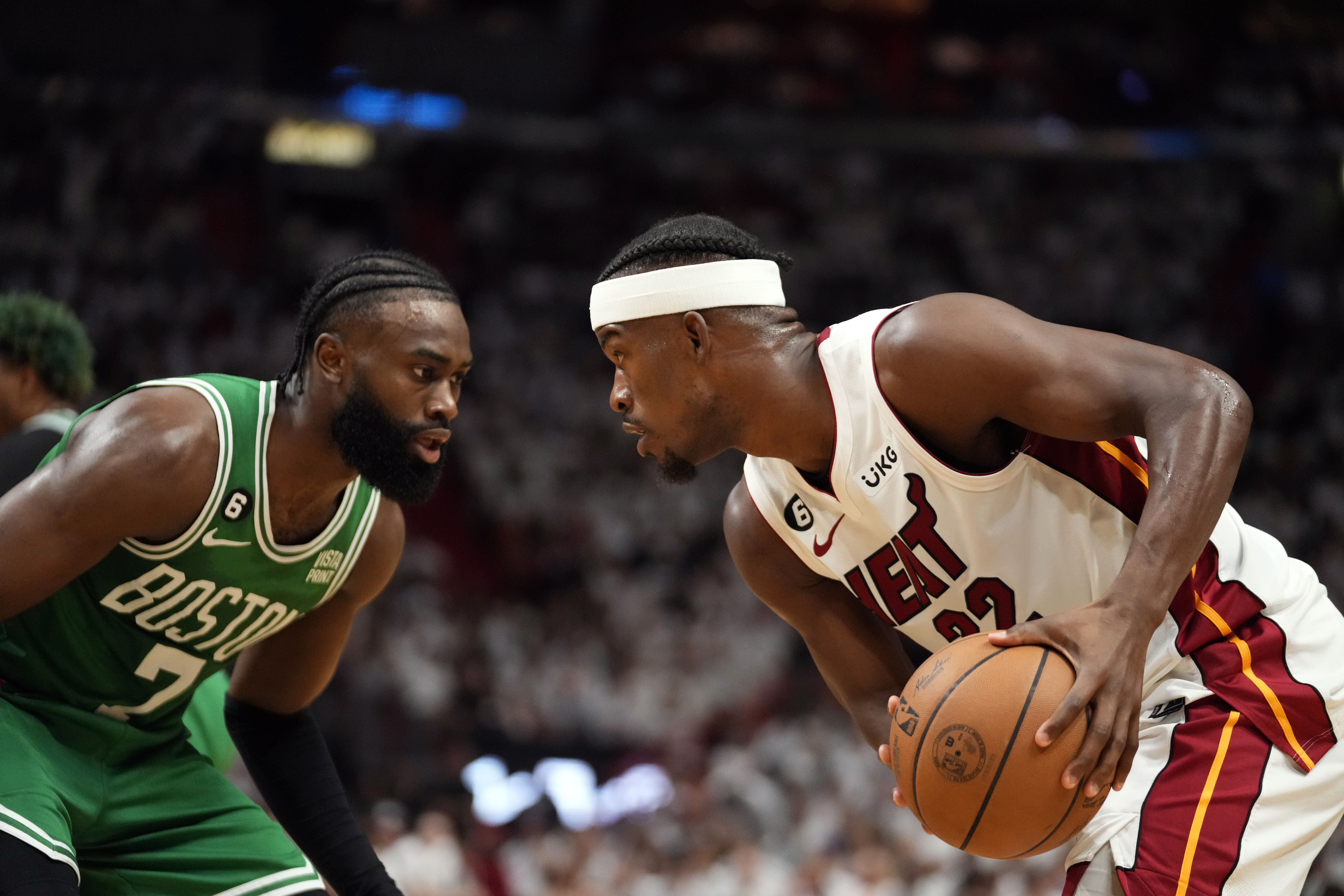Miami Heat forward Jimmy Butler (22) controls the ball against Boston Celtics guard Jaylen Brown (7) in the second quarter during game six of the Eastern Conference Finals for the 2023 NBA playoffs at Kaseya Center.