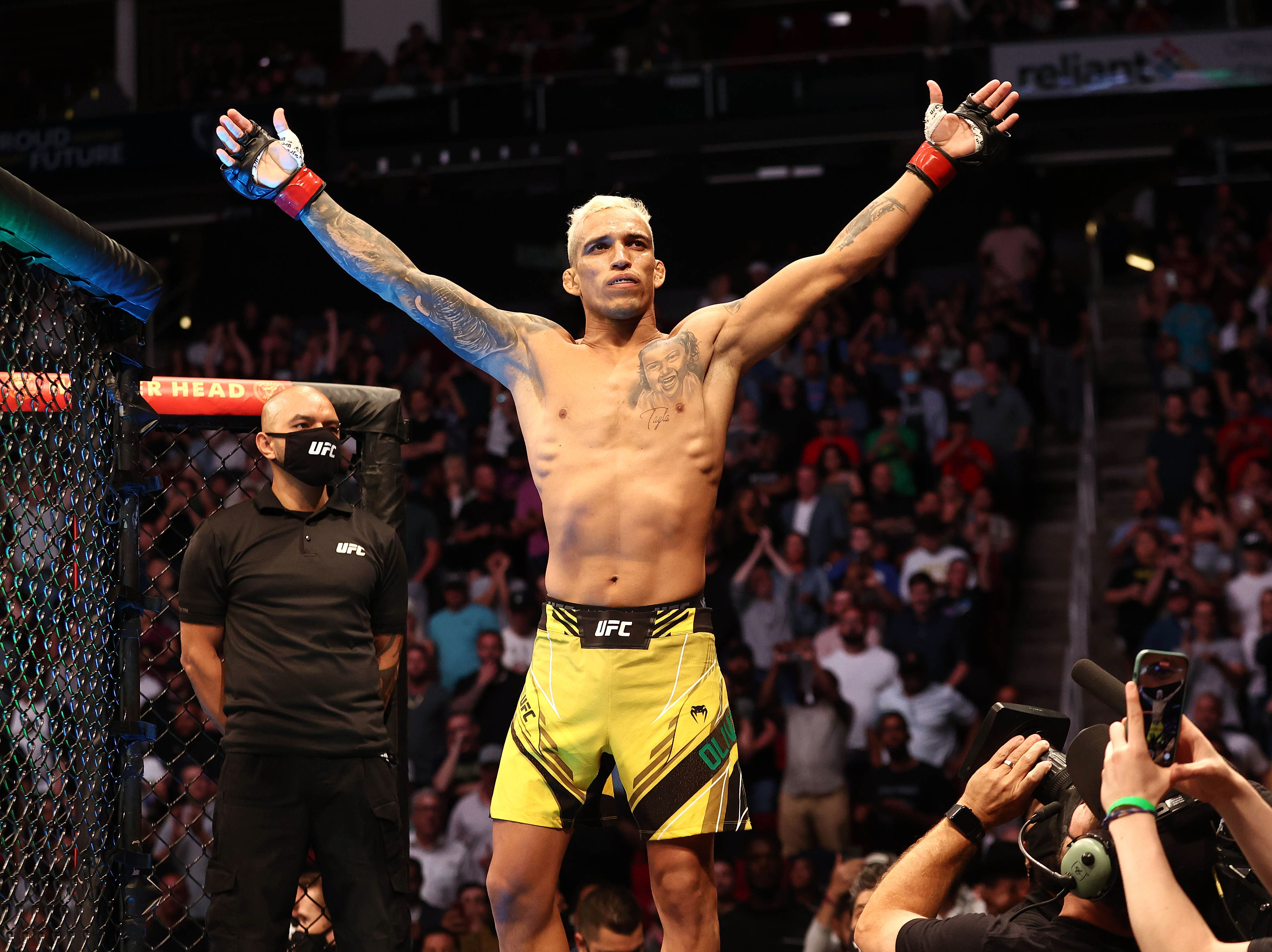 May 15, 2021; Houston, Texas, USA; Charles Oliveira reacts for his fight against Michael Chandler during UFC 262 at Toyota Center.