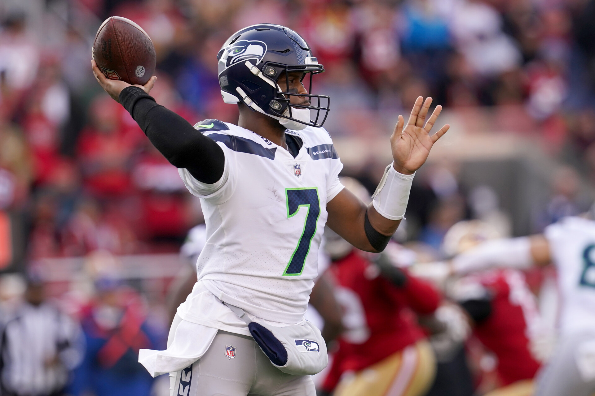 Jan 14, 2023; Santa Clara, California, USA; Seattle Seahawks quarterback Geno Smith (7) makes a throw in the second quarter of a wild card game against the San Francisco 49ers at Levi's Stadium.