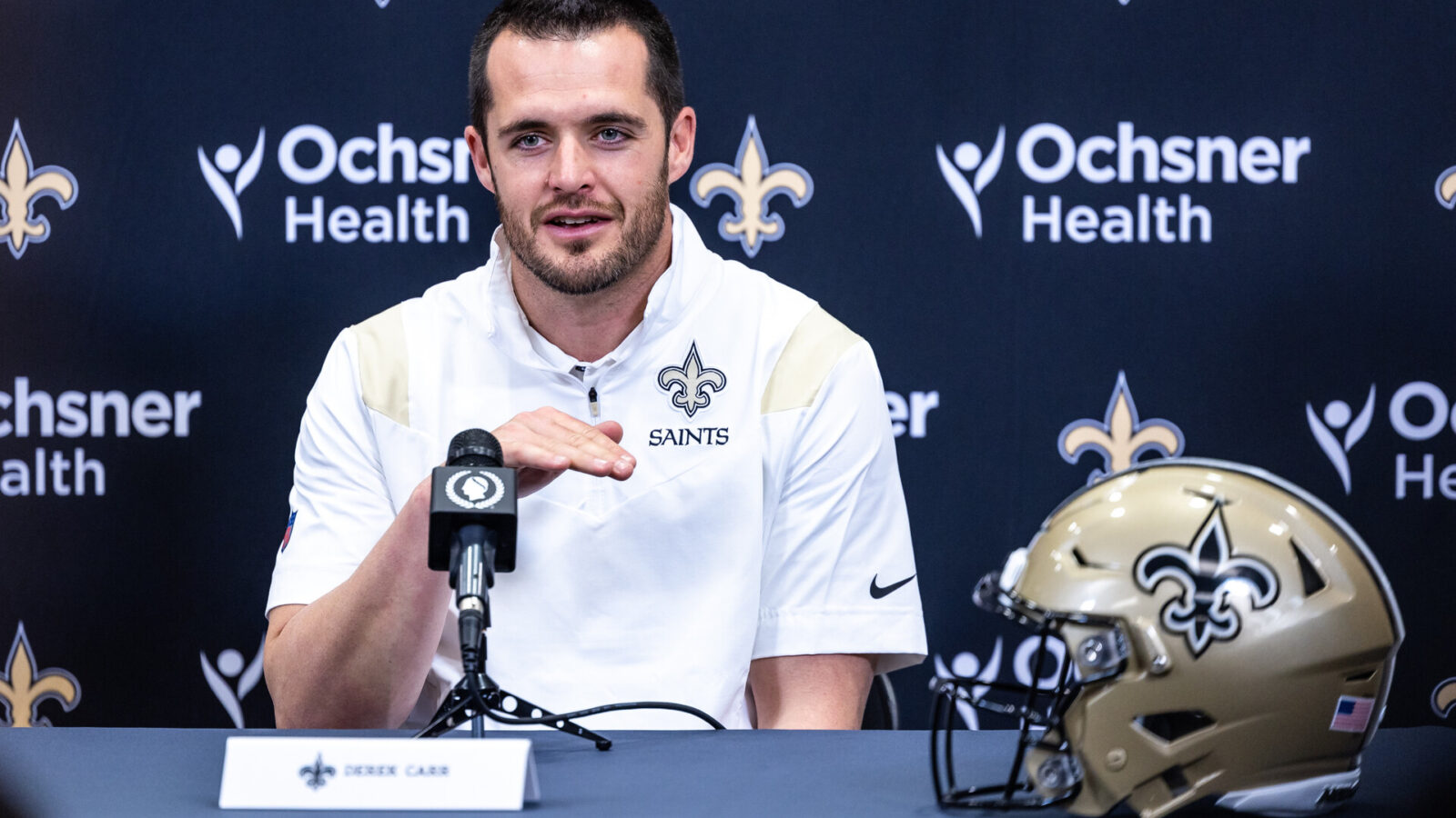 New Orleans Saints quarterback Derek Carr (4) speaks at Ochsner Sports Performance Center.