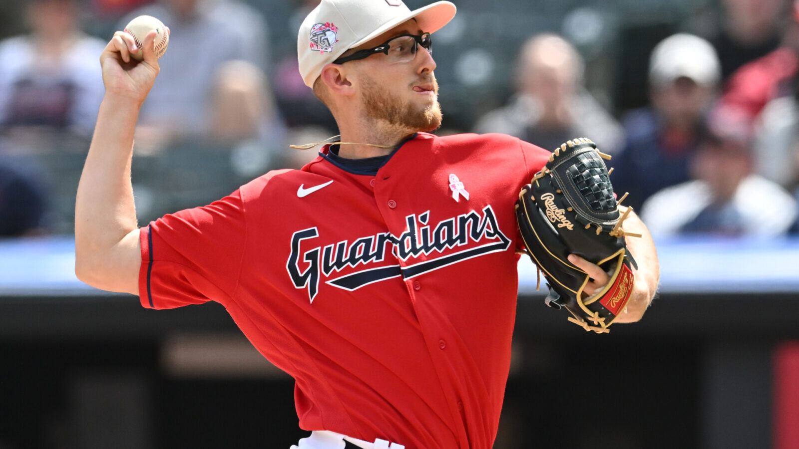 Cleveland Guardians starting pitcher Tanner Bibee (61) throws a pitch during the first inning against the Los Angeles Angels at Progressive Field.