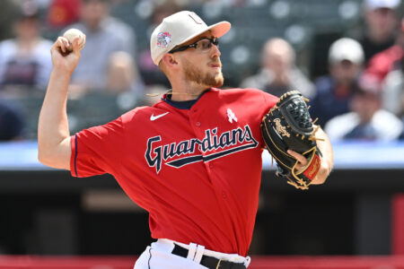Cleveland Guardians starting pitcher Tanner Bibee (61) throws a pitch during the first inning against the Los Angeles Angels at Progressive Field.