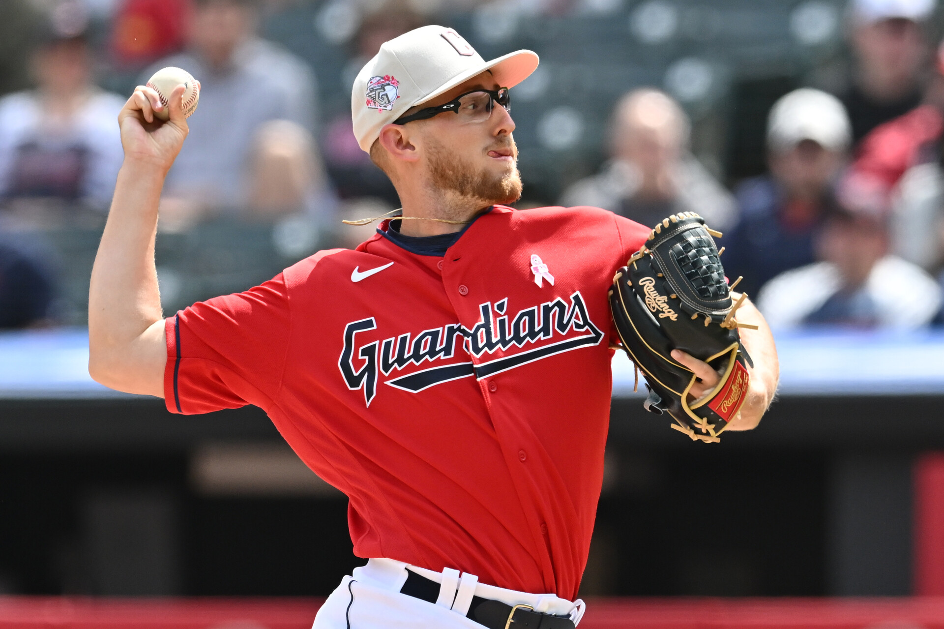 Cleveland Guardians starting pitcher Tanner Bibee (61) throws a pitch during the first inning against the Los Angeles Angels at Progressive Field.