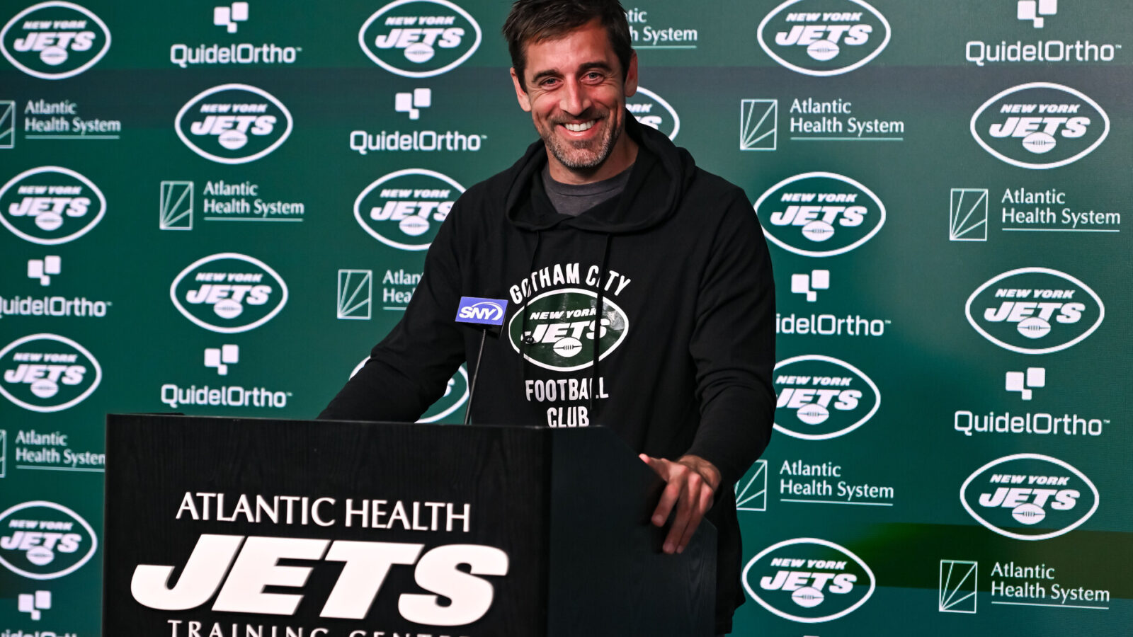May 23, 2023; Florham Park, NJ, USA; New York Jets quarterback Aaron Rodgers (8) speaks at a press conference after practice at Atlantic Health Jets Training Center.