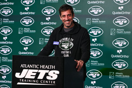 May 23, 2023; Florham Park, NJ, USA; New York Jets quarterback Aaron Rodgers (8) speaks at a press conference after practice at Atlantic Health Jets Training Center.