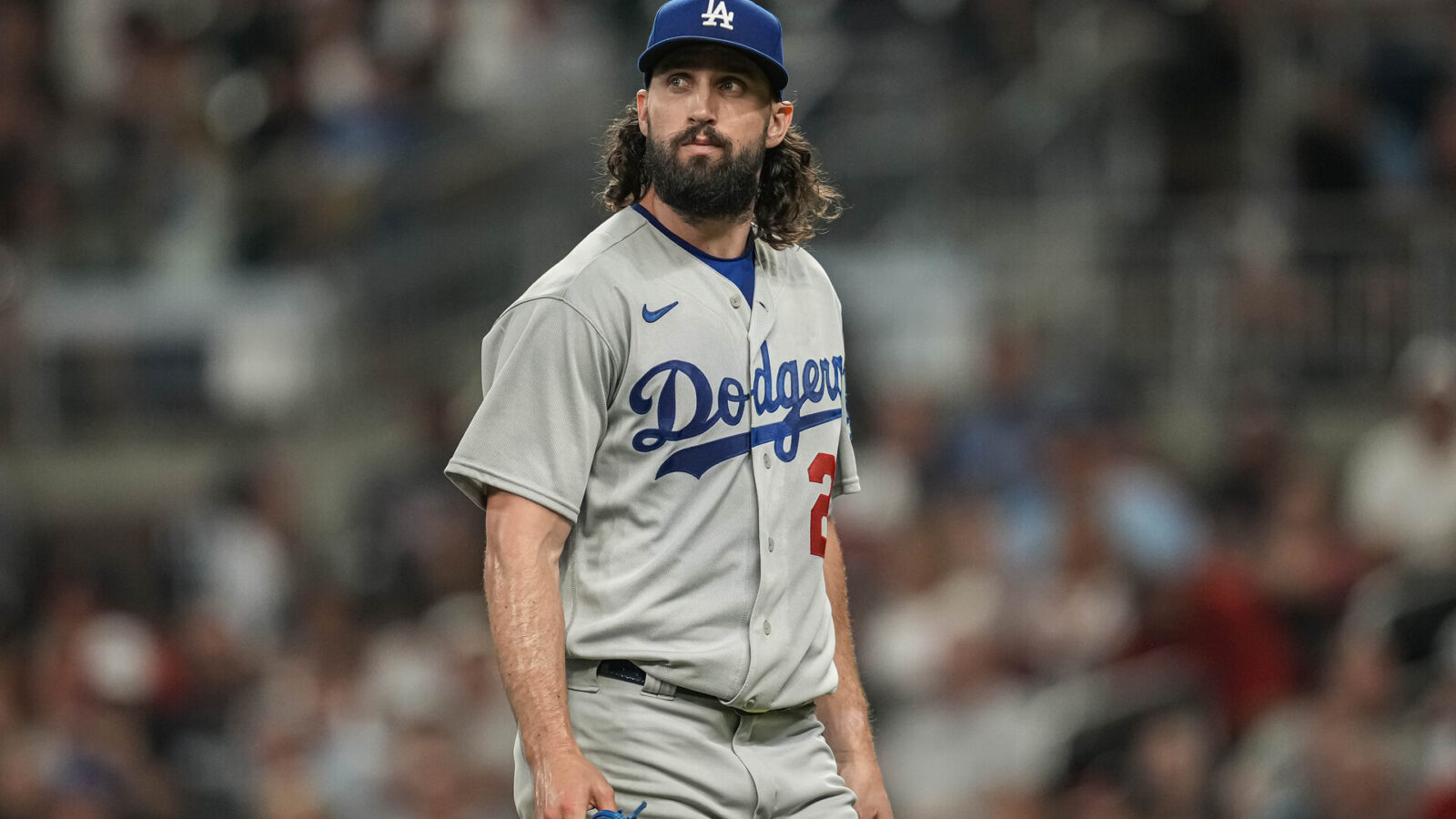 May 24, 2023; Cumberland, Georgia, USA; Los Angeles Dodgers starting pitcher Tony Gonsolin (26) leaves the field after being removed from the game against the Atlanta Braves during the sixth inning at Truist Park.