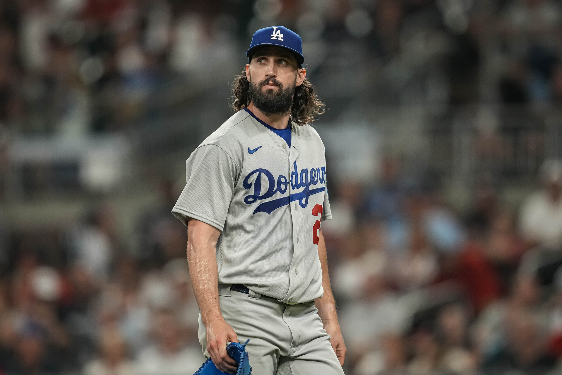 May 24, 2023; Cumberland, Georgia, USA; Los Angeles Dodgers starting pitcher Tony Gonsolin (26) leaves the field after being removed from the game against the Atlanta Braves during the sixth inning at Truist Park.