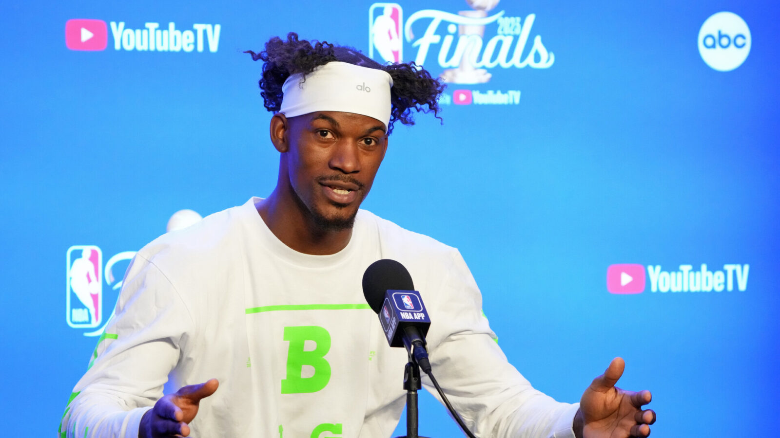 Miami Heat forward Jimmy Butler (22) talks to the media on media day before the 2023 NBA Finals at Ball Arena.
