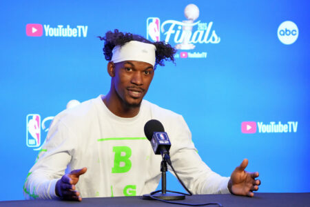 Miami Heat forward Jimmy Butler (22) talks to the media on media day before the 2023 NBA Finals at Ball Arena.