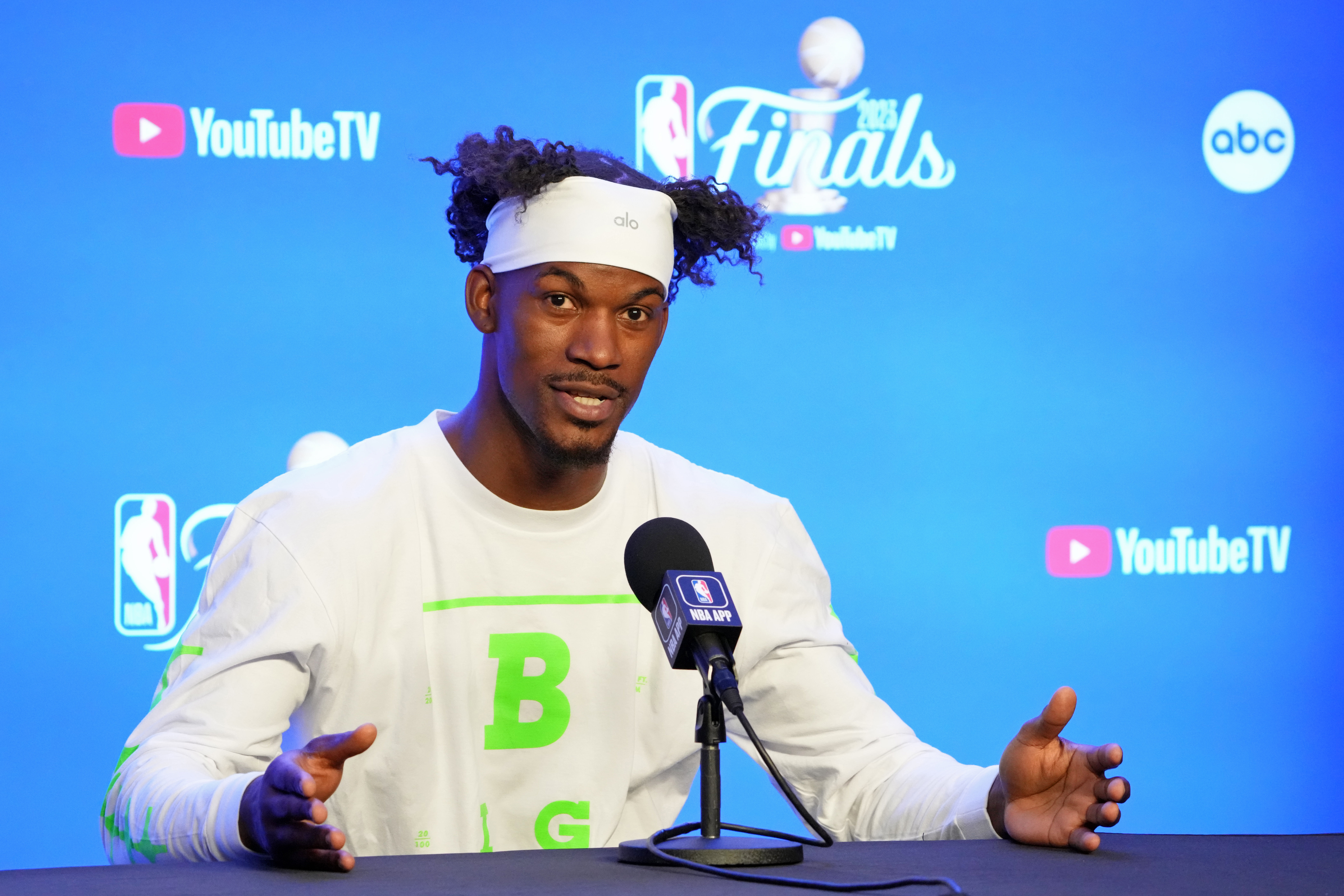 Miami Heat forward Jimmy Butler (22) talks to the media on media day before the 2023 NBA Finals at Ball Arena.