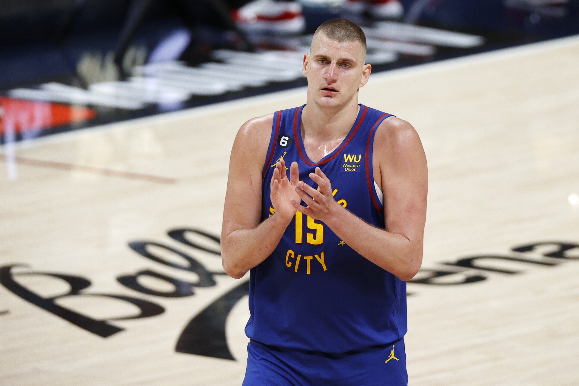 Jun 1, 2023; Denver, CO, USA; Denver Nuggets center Nikola Jokic (15) celebrates after game one of the 2023 NBA Finals against the Miami Heat at Ball Arena.