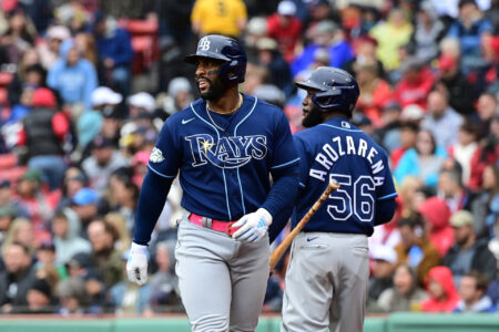 Jun 4, 2023; Boston, Massachusetts, USA; Tampa Bay Rays designated hitter Yandy Diaz (2) celebrates scoring on his RBI single after a throwing error by the Boston Red Sox during the sixth inning at Fenway Park.