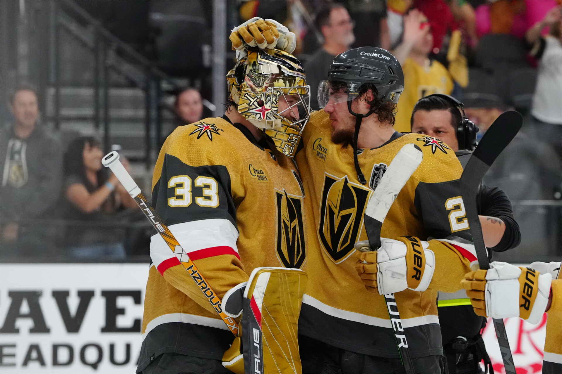 Vegas Golden Knights goaltender Adin Hill (33) celebrates with defenseman Zach Whitecloud (2) after defeating the Florida Panthers in game two of the 2023 Stanley Cup Final at T-Mobile Arena.