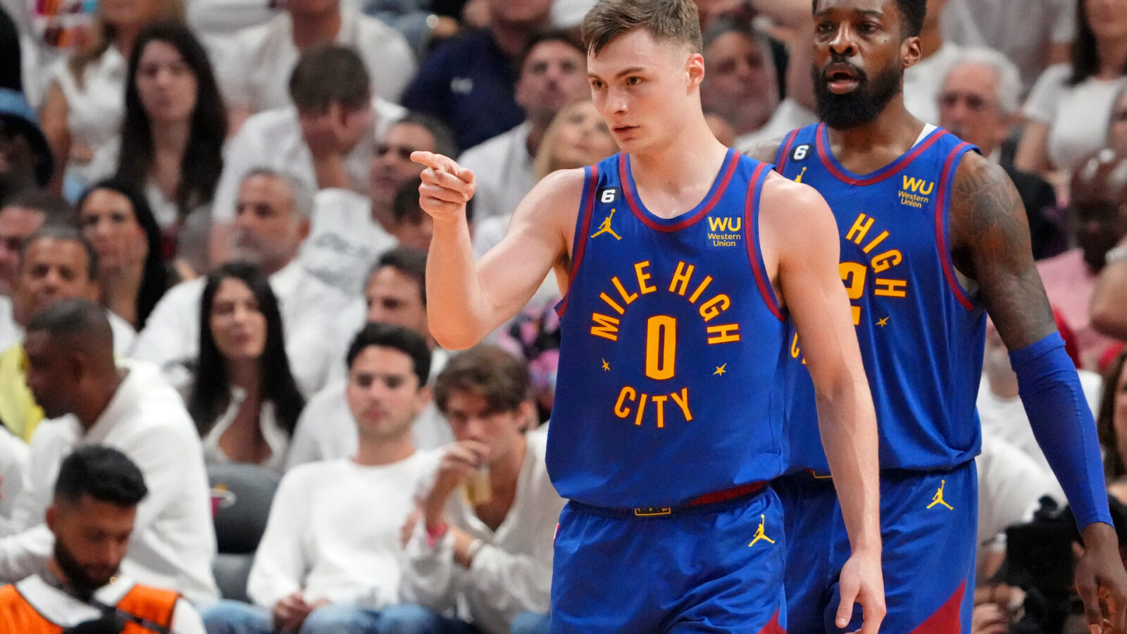 Denver Nuggets guard Christian Braun (0) gestures after a play against the Miami Heat during the third quarter in game three of the 2023 NBA Finals at Kaseya Center.