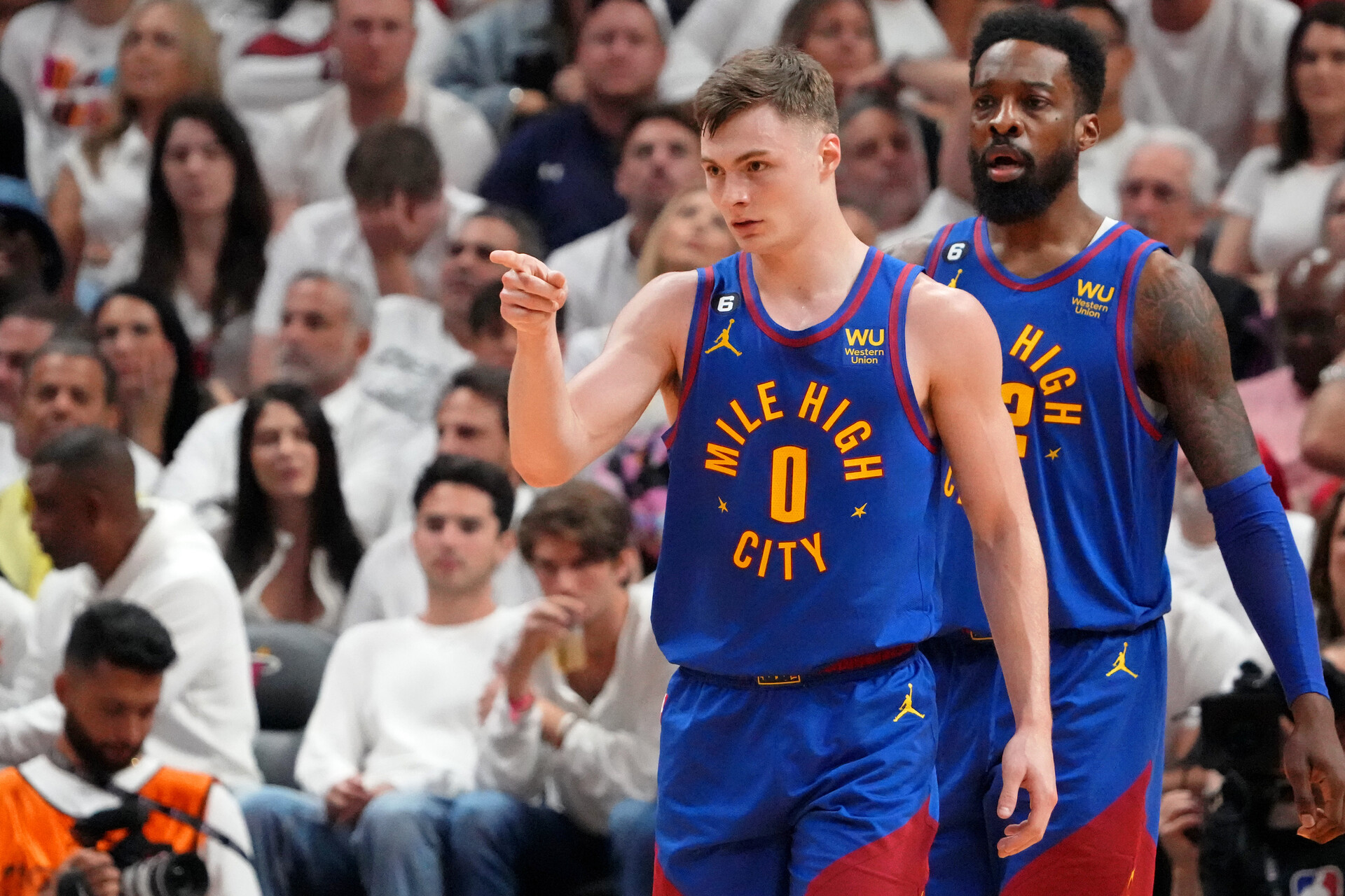 Denver Nuggets guard Christian Braun (0) gestures after a play against the Miami Heat during the third quarter in game three of the 2023 NBA Finals at Kaseya Center.
