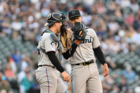 Jun 12, 2023; Seattle, Washington, USA; Miami Marlins catcher Nick Fortes (4) and starting pitcher Jesus Luzardo (44) talk on the mound during the fourth inning against the Seattle Mariners at T-Mobile Park.