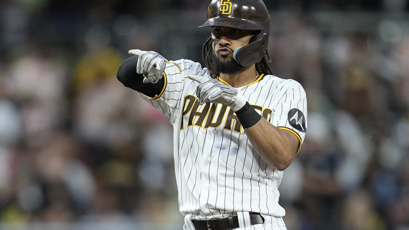 Jun 14, 2023; San Diego, California, USA; San Diego Padres right fielder Fernando Tatis Jr. (23) reacts to his double against the Cleveland Guardians during the fourth inning at Petco Park.