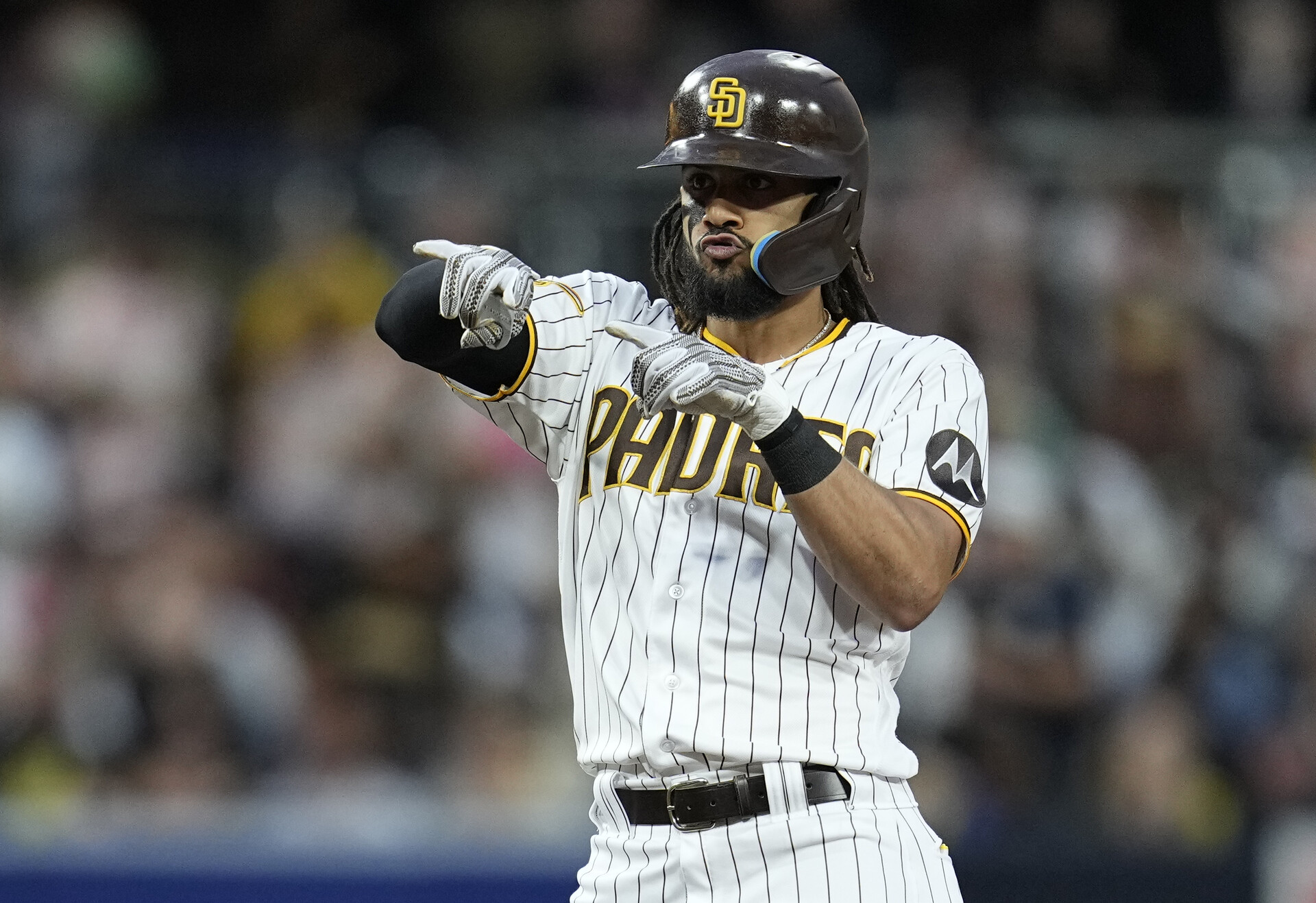 Jun 14, 2023; San Diego, California, USA; San Diego Padres right fielder Fernando Tatis Jr. (23) reacts to his double against the Cleveland Guardians during the fourth inning at Petco Park.