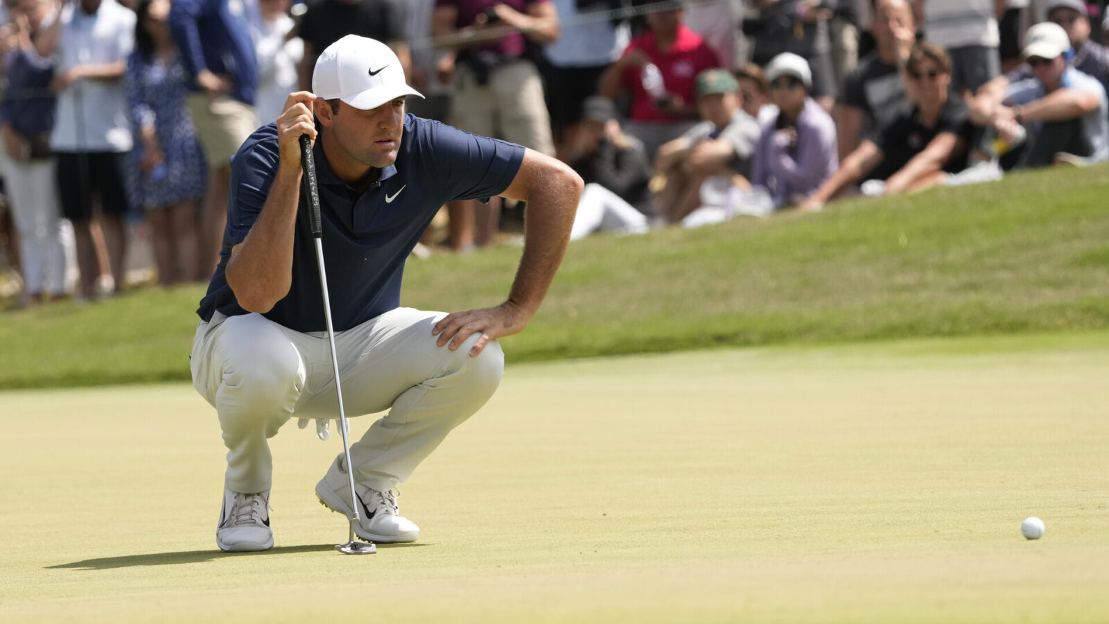 Jun 18, 2023; Los Angeles, California, USA; Scottie Scheffler prepares to putt on the second green during the final round of the U.S. Open golf tournament at Los Angeles Country Club.