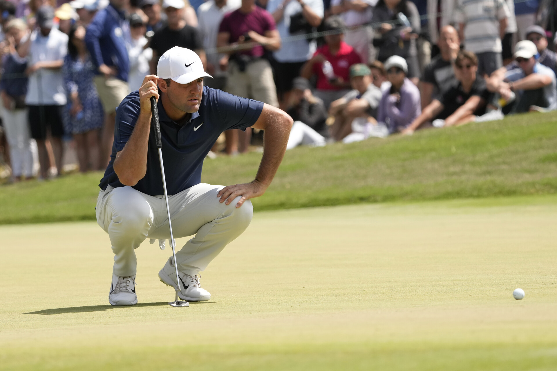 Jun 18, 2023; Los Angeles, California, USA; Scottie Scheffler prepares to putt on the second green during the final round of the U.S. Open golf tournament at Los Angeles Country Club.