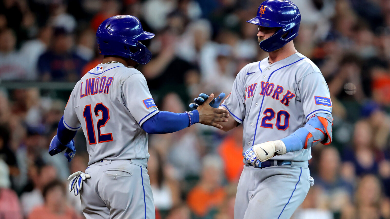Jun 21, 2023; Houston, Texas, USA; New York Mets first baseman Pete Alonso (20) is congratulated by shortstop Francisco Lindor (12) after hitting a two-run home run against the Houston Astros during the sixth inning at Minute Maid Park.