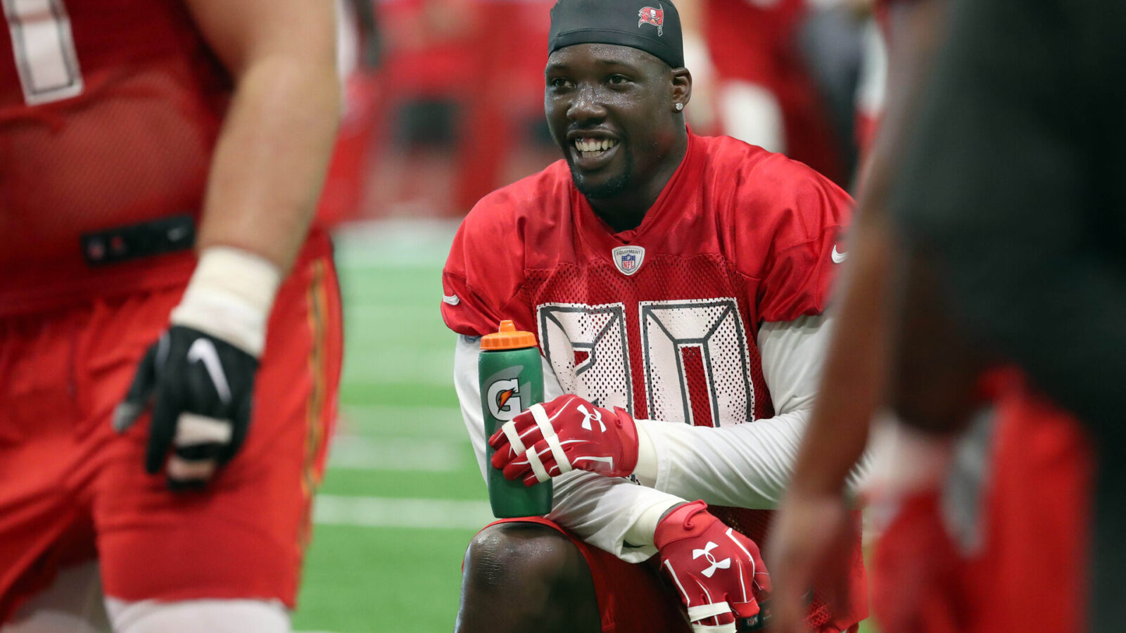 Tampa Bay Buccaneers defensive end Jason Pierre-Paul (90) smiles during training campat One Buccaneer Place.