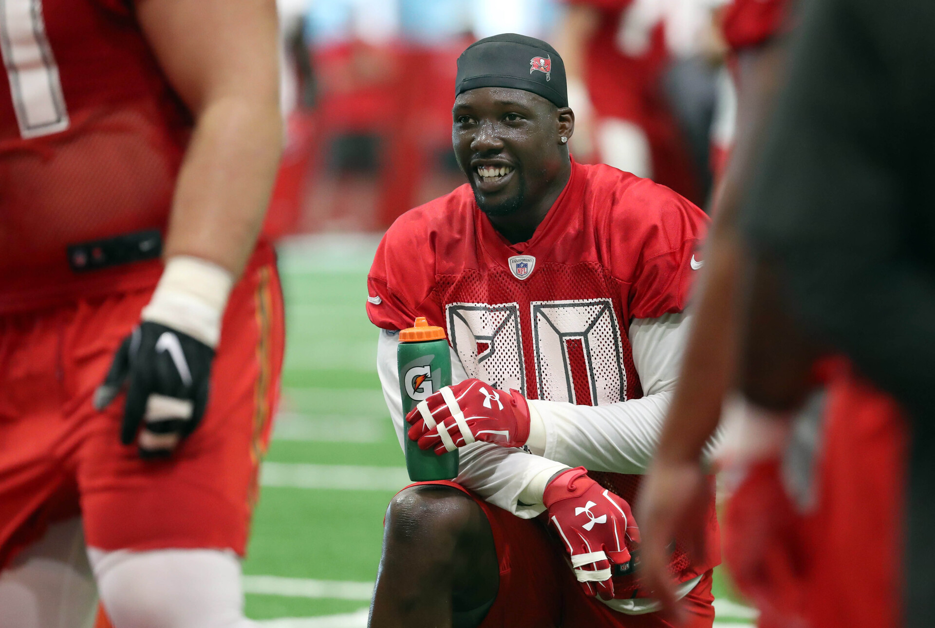Tampa Bay Buccaneers defensive end Jason Pierre-Paul (90) smiles during training campat One Buccaneer Place.