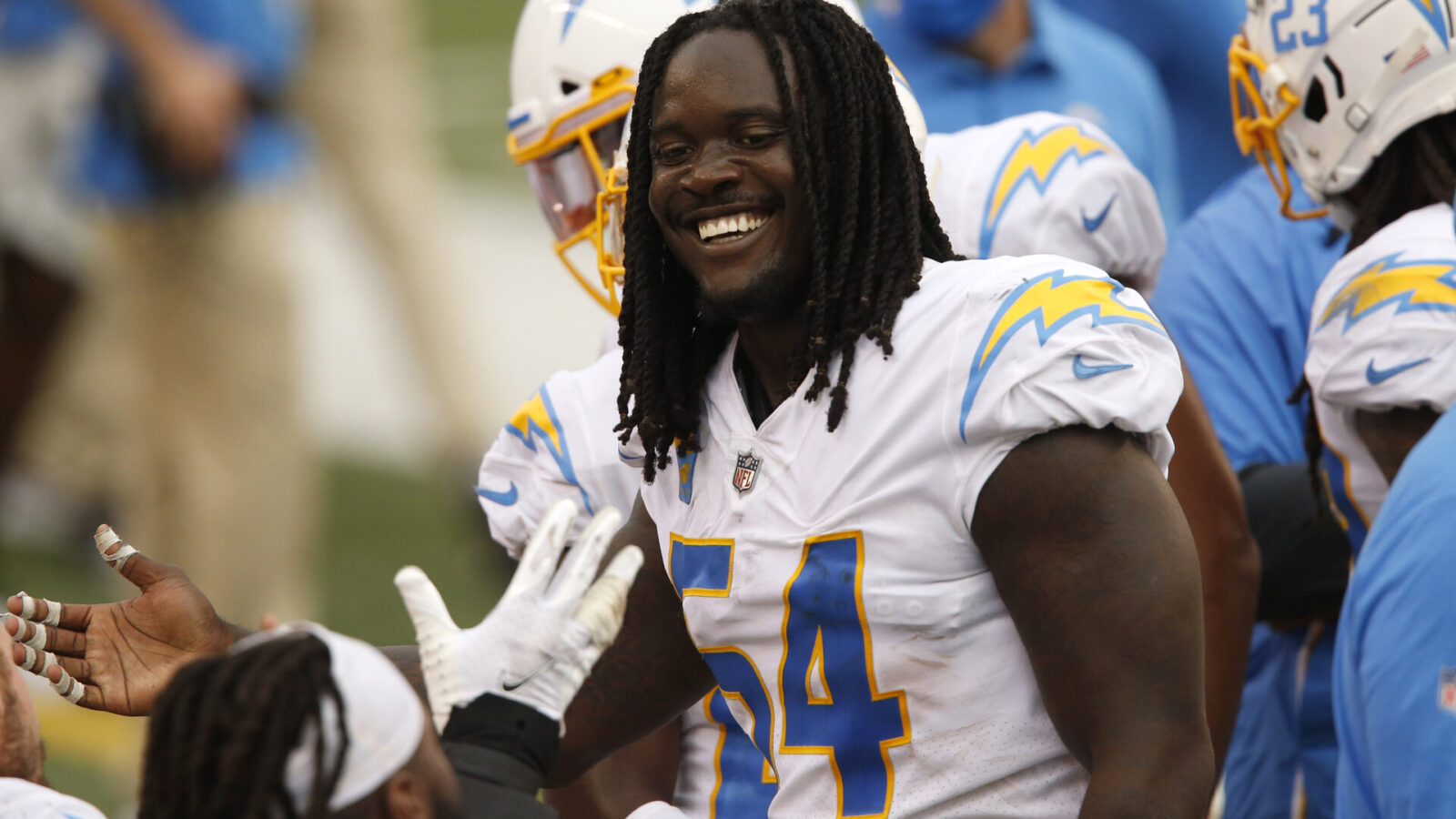 Los Angeles Chargers defensive end Melvin Ingram (54) celebrates after his fourth quarter interception against the Cincinnati Bengals during the second half at Paul Brown Stadium.